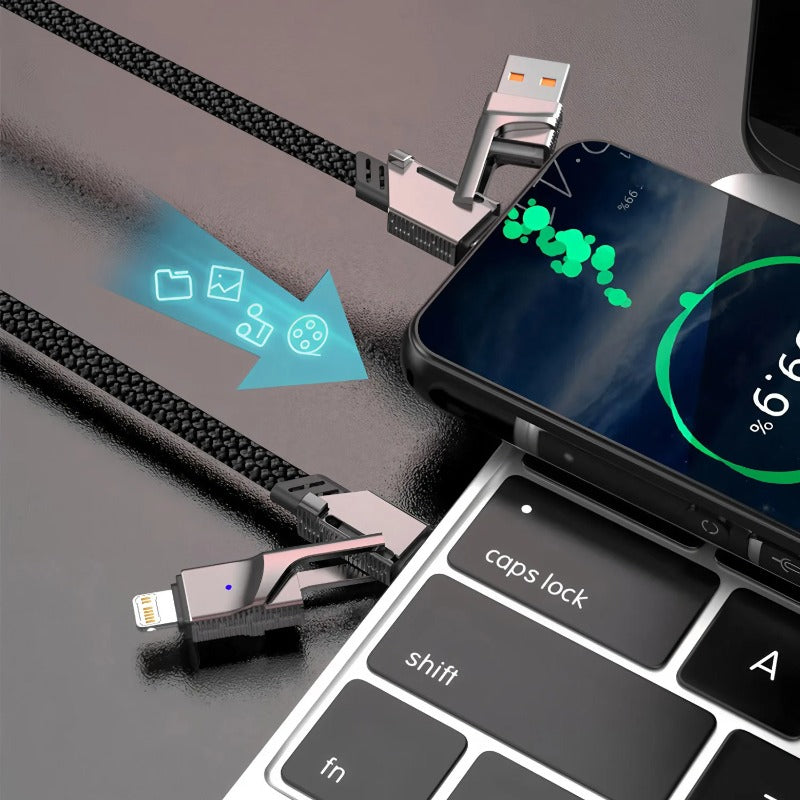 4-in-1 fast charging cable charging a phone beside a laptop