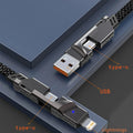 Close-up of 4-in-1 cable ends showing USB-A, Type-C and Lightning plugs